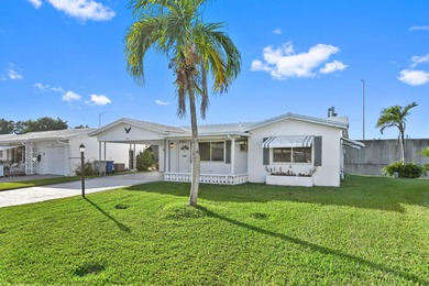 Live in the MOST UNIQUE, fully remodeled & improved 3/2 home in on Leisureville Community Association in Florida - for sale on GolfHomes.com, golf home, golf lot