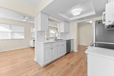 This move-in ready, newly renovated and spacious three bedroom on Leisureville Community Association in Florida - for sale on GolfHomes.com, golf home, golf lot