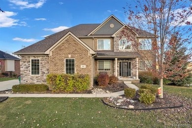 This beautifully appointed 5-bedroom, 4-bathroom home, built in on Boulder Pointe Golf Club and Conference Center in Michigan - for sale on GolfHomes.com, golf home, golf lot