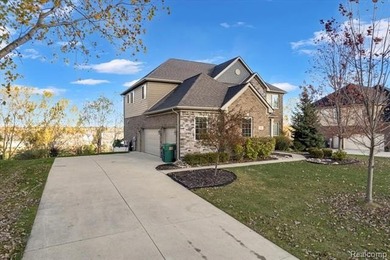 This beautifully appointed 5-bedroom, 4-bathroom home, built in on Boulder Pointe Golf Club and Conference Center in Michigan - for sale on GolfHomes.com, golf home, golf lot
