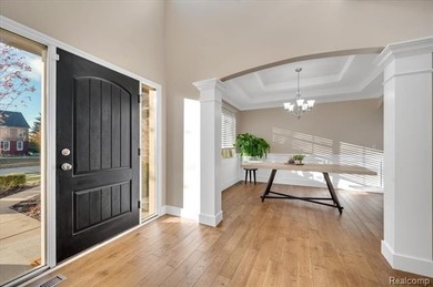 This beautifully appointed 5-bedroom, 4-bathroom home, built in on Boulder Pointe Golf Club and Conference Center in Michigan - for sale on GolfHomes.com, golf home, golf lot