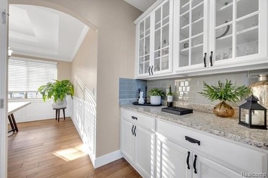 This beautifully appointed 5-bedroom, 4-bathroom home, built in on Boulder Pointe Golf Club and Conference Center in Michigan - for sale on GolfHomes.com, golf home, golf lot