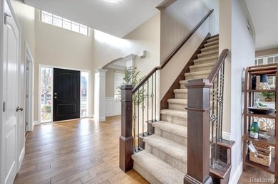 This beautifully appointed 5-bedroom, 4-bathroom home, built in on Boulder Pointe Golf Club and Conference Center in Michigan - for sale on GolfHomes.com, golf home, golf lot