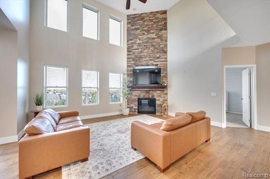 This beautifully appointed 5-bedroom, 4-bathroom home, built in on Boulder Pointe Golf Club and Conference Center in Michigan - for sale on GolfHomes.com, golf home, golf lot