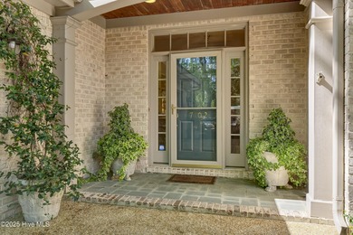 Experience refined living in this beautifully maintained brick on Country Club of Landfall in North Carolina - for sale on GolfHomes.com, golf home, golf lot