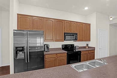 Charming cottage-style home in the desirable Winsor Meadows at on WestRidge Golf Course in Texas - for sale on GolfHomes.com, golf home, golf lot