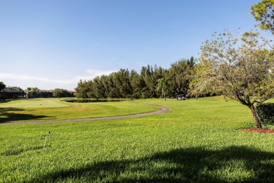 Welcome to this beautifully updated 2/2 unit w/a serene golf on Flamingo Lakes Country Club in Florida - for sale on GolfHomes.com, golf home, golf lot