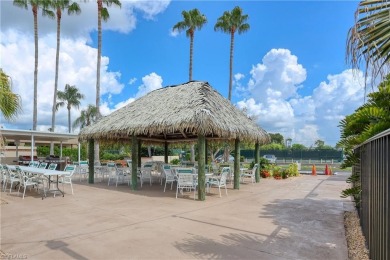 This Large Waterfront End Unit Condo features 2 Master Bedrooms on Seven Lakes Golf and Tennis Community in Florida - for sale on GolfHomes.com, golf home, golf lot