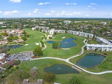 This Large Waterfront End Unit Condo features 2 Master Bedrooms on Seven Lakes Golf and Tennis Community in Florida - for sale on GolfHomes.com, golf home, golf lot