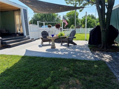 Welcome to the ultimate retreat at 42 Timber Lane, Linn Valley on Linn Valley Lakes - Deer Trace Golf Course in Kansas - for sale on GolfHomes.com, golf home, golf lot