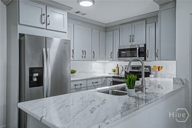 Welcome to effortless, maintenance-free living in The Landings on The Landings Club - Marshwood in Georgia - for sale on GolfHomes.com, golf home, golf lot