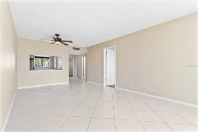 GROUND FLOOR, CORNER UNIT WITH UNOBSTRUCTED GOLF COURSE VIEWS on Feather Sound Country Club in Florida - for sale on GolfHomes.com, golf home, golf lot