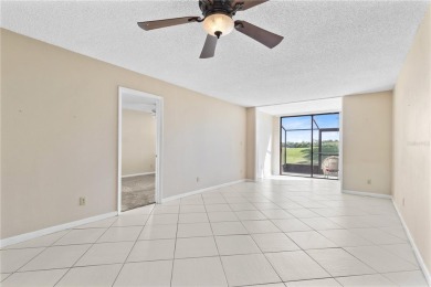 GROUND FLOOR, CORNER UNIT WITH UNOBSTRUCTED GOLF COURSE VIEWS on Feather Sound Country Club in Florida - for sale on GolfHomes.com, golf home, golf lot