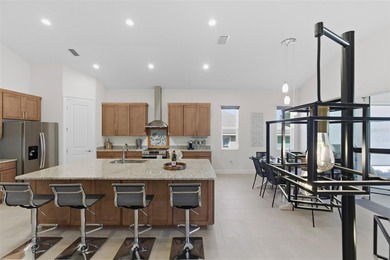 Welcome Home to luxury living in the double-gated Bella Vista on Harbor Hills Country Club in Florida - for sale on GolfHomes.com, golf home, golf lot