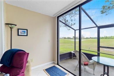 GROUND FLOOR, CORNER UNIT WITH UNOBSTRUCTED GOLF COURSE VIEWS on Feather Sound Country Club in Florida - for sale on GolfHomes.com, golf home, golf lot