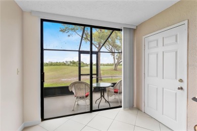 GROUND FLOOR, CORNER UNIT WITH UNOBSTRUCTED GOLF COURSE VIEWS on Feather Sound Country Club in Florida - for sale on GolfHomes.com, golf home, golf lot