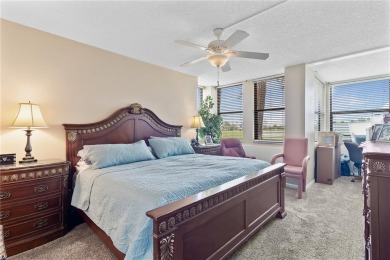 GROUND FLOOR, CORNER UNIT WITH UNOBSTRUCTED GOLF COURSE VIEWS on Feather Sound Country Club in Florida - for sale on GolfHomes.com, golf home, golf lot