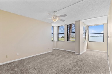 GROUND FLOOR, CORNER UNIT WITH UNOBSTRUCTED GOLF COURSE VIEWS on Feather Sound Country Club in Florida - for sale on GolfHomes.com, golf home, golf lot