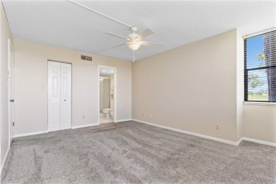 GROUND FLOOR, CORNER UNIT WITH UNOBSTRUCTED GOLF COURSE VIEWS on Feather Sound Country Club in Florida - for sale on GolfHomes.com, golf home, golf lot