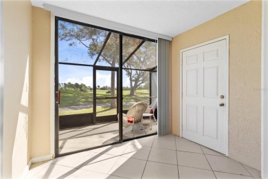 GROUND FLOOR, CORNER UNIT WITH UNOBSTRUCTED GOLF COURSE VIEWS on Feather Sound Country Club in Florida - for sale on GolfHomes.com, golf home, golf lot