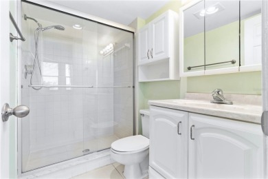 GROUND FLOOR, CORNER UNIT WITH UNOBSTRUCTED GOLF COURSE VIEWS on Feather Sound Country Club in Florida - for sale on GolfHomes.com, golf home, golf lot