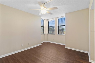 GROUND FLOOR, CORNER UNIT WITH UNOBSTRUCTED GOLF COURSE VIEWS on Feather Sound Country Club in Florida - for sale on GolfHomes.com, golf home, golf lot