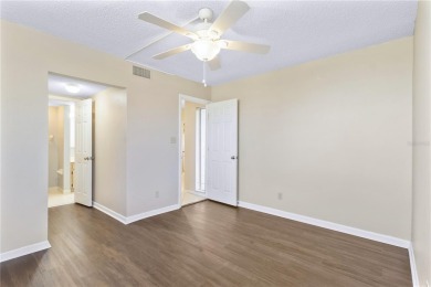 GROUND FLOOR, CORNER UNIT WITH UNOBSTRUCTED GOLF COURSE VIEWS on Feather Sound Country Club in Florida - for sale on GolfHomes.com, golf home, golf lot