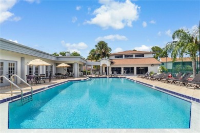 GROUND FLOOR, CORNER UNIT WITH UNOBSTRUCTED GOLF COURSE VIEWS on Feather Sound Country Club in Florida - for sale on GolfHomes.com, golf home, golf lot