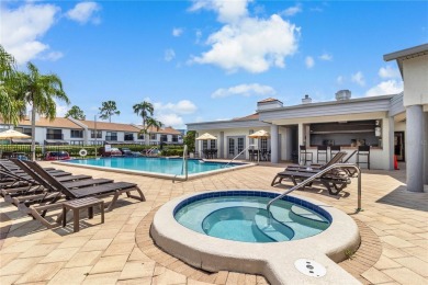 GROUND FLOOR, CORNER UNIT WITH UNOBSTRUCTED GOLF COURSE VIEWS on Feather Sound Country Club in Florida - for sale on GolfHomes.com, golf home, golf lot