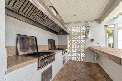 GROUND FLOOR, CORNER UNIT WITH UNOBSTRUCTED GOLF COURSE VIEWS on Feather Sound Country Club in Florida - for sale on GolfHomes.com, golf home, golf lot