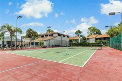 GROUND FLOOR, CORNER UNIT WITH UNOBSTRUCTED GOLF COURSE VIEWS on Feather Sound Country Club in Florida - for sale on GolfHomes.com, golf home, golf lot