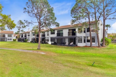 GROUND FLOOR, CORNER UNIT WITH UNOBSTRUCTED GOLF COURSE VIEWS on Feather Sound Country Club in Florida - for sale on GolfHomes.com, golf home, golf lot