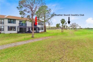 GROUND FLOOR, CORNER UNIT WITH UNOBSTRUCTED GOLF COURSE VIEWS on Feather Sound Country Club in Florida - for sale on GolfHomes.com, golf home, golf lot