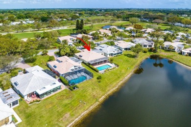 Presenting a lakeside retreat with breathtaking water views and on Hunters Run Golf and Country Club in Florida - for sale on GolfHomes.com, golf home, golf lot