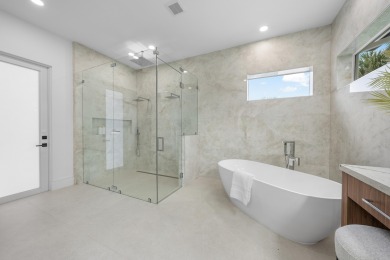 Absolutely MINT! Offering an impressive .65 acre Lot with both on Atlantis Golf Club in Florida - for sale on GolfHomes.com, golf home, golf lot