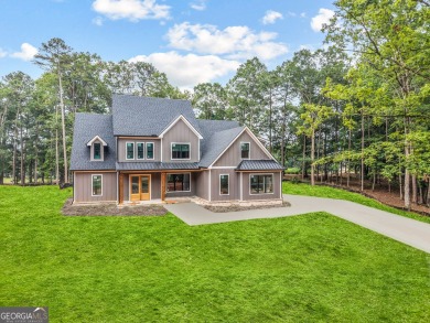 Welcome to refined living in this stunning new construction on Harbor Club Golf and Country Club in Georgia - for sale on GolfHomes.com, golf home, golf lot