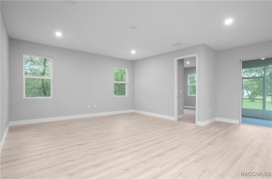 ABSOLUTELY BEAUTIFUL BRAND NEW 4 -bedroom, 2.5-bathroom home on Southern Woods Golf Club in Florida - for sale on GolfHomes.com, golf home, golf lot