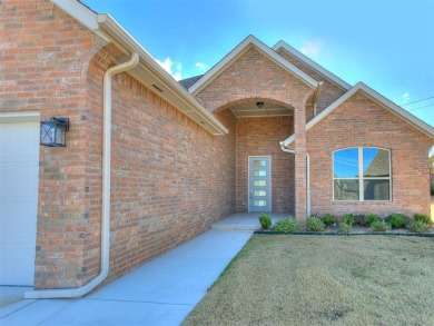 Experience the joy of entertaining your guests in this bright on Golf Club At Surrey Hills in Oklahoma - for sale on GolfHomes.com, golf home, golf lot