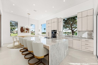 Move right into this never-lived-in, reimagined 3-bedroom, 3 on St. Andrews Country Club of Boca Raton in Florida - for sale on GolfHomes.com, golf home, golf lot