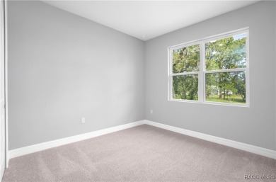 ABSOLUTELY BEAUTIFUL BRAND NEW 4 -bedroom, 2.5-bathroom home on Southern Woods Golf Club in Florida - for sale on GolfHomes.com, golf home, golf lot