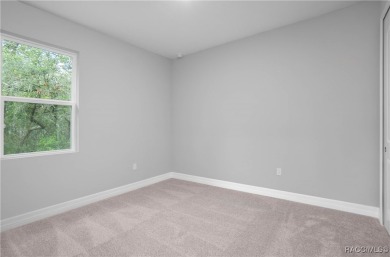 ABSOLUTELY BEAUTIFUL BRAND NEW 4 -bedroom, 2.5-bathroom home on Southern Woods Golf Club in Florida - for sale on GolfHomes.com, golf home, golf lot