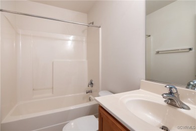 Welcome to this charming 1.5-story single-family home located on on Providence Golf Course in Virginia - for sale on GolfHomes.com, golf home, golf lot