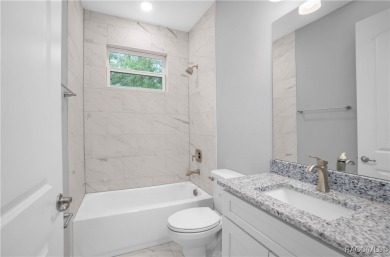 ABSOLUTELY BEAUTIFUL BRAND NEW 4 -bedroom, 2.5-bathroom home on Southern Woods Golf Club in Florida - for sale on GolfHomes.com, golf home, golf lot