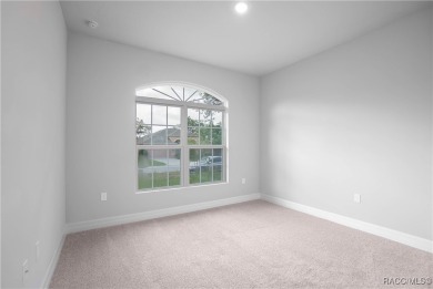 ABSOLUTELY BEAUTIFUL BRAND NEW 4 -bedroom, 2.5-bathroom home on Southern Woods Golf Club in Florida - for sale on GolfHomes.com, golf home, golf lot