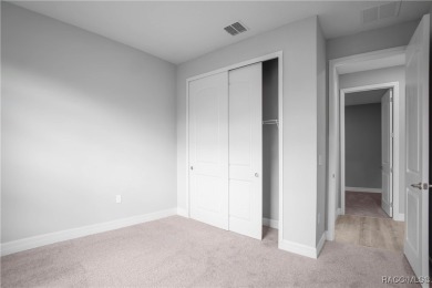 ABSOLUTELY BEAUTIFUL BRAND NEW 4 -bedroom, 2.5-bathroom home on Southern Woods Golf Club in Florida - for sale on GolfHomes.com, golf home, golf lot