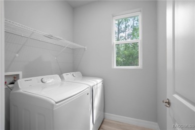 ABSOLUTELY BEAUTIFUL BRAND NEW 4 -bedroom, 2.5-bathroom home on Southern Woods Golf Club in Florida - for sale on GolfHomes.com, golf home, golf lot