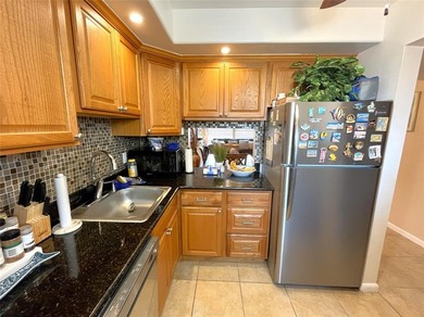 WONDERFUL 1 BEDROOM 1 BATHROOM CONDO IN DESIREABLE COMMUNITY OF on Oriole Golf and Tennis Club in Florida - for sale on GolfHomes.com, golf home, golf lot