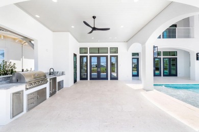 Pristine architectural design paired with sweeping golf course on Santa Rosa Golf and Beach Club in Florida - for sale on GolfHomes.com, golf home, golf lot