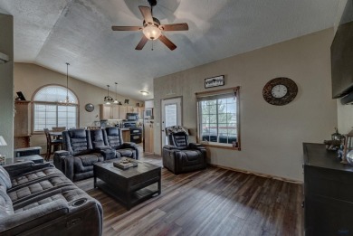 This beautiful four bedroom 3 bath home features LVP throughout on Fountain Springs Golf Club in South Dakota - for sale on GolfHomes.com, golf home, golf lot