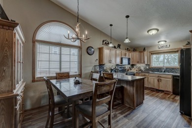 This beautiful four bedroom 3 bath home features LVP throughout on Fountain Springs Golf Club in South Dakota - for sale on GolfHomes.com, golf home, golf lot